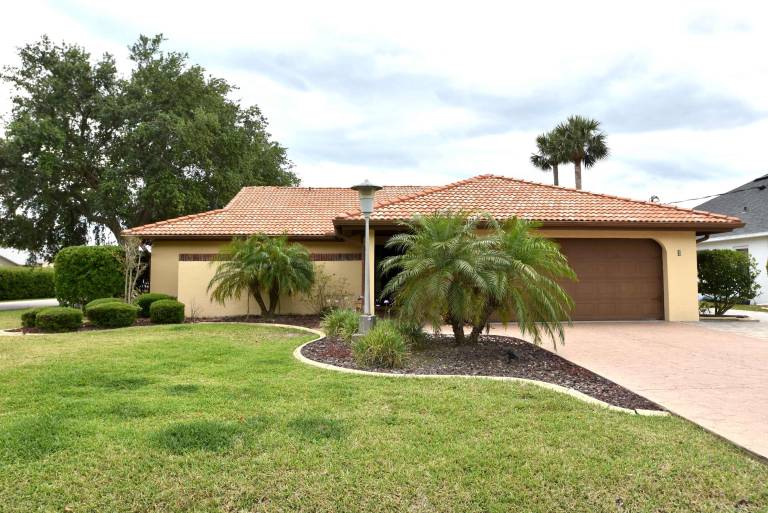 Salty Breeze Canal Front Pool Home W boat dock — photo 2