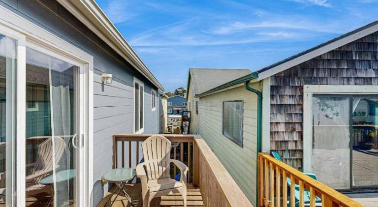 Dog-friendly home near the ocean with gas fireplace & partial water views — photo 5