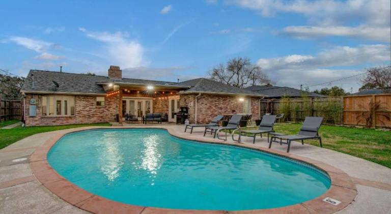 Vacation home with yard, private pool & grill in Houston, TX