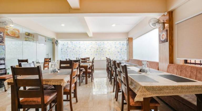 FabHotel La Palma Suites Nr RMZ Eco world