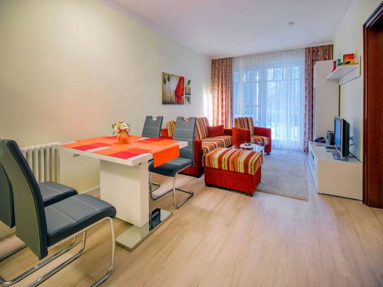 Komfortplus Ferienwohnung mit 1 Schlafzimmer und Terrasse im Erdgeschoss — photo 2