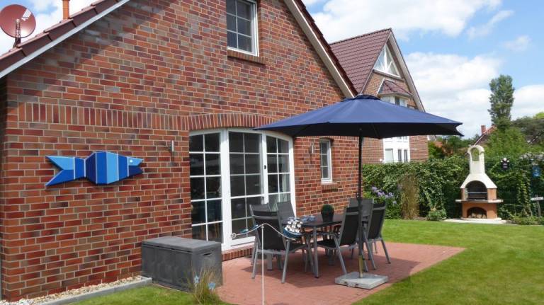 Hochwertiges Ferienhaus mit Garten in zentraler Lage