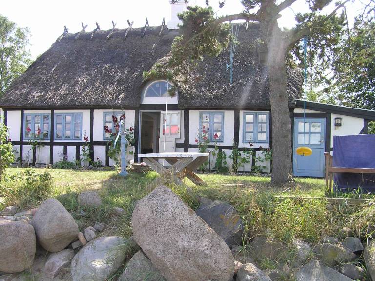 Cozy holiday home located right on the beach in Vejle