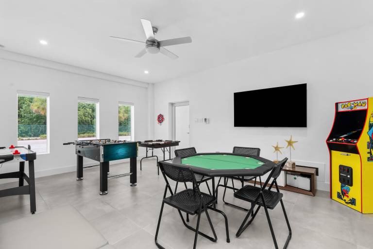 Saltwater Social Game Room Pool Dock Views — photo 5