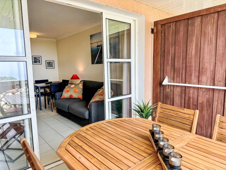 Family-oriented rental apartment with patio, pool & yard | Sea view | Dogs allowed — photo 4
