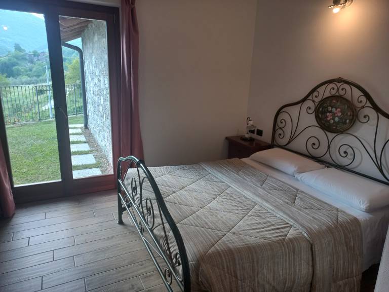 Nona Rosa: 2 camere comunicanti con giardino — photo 3