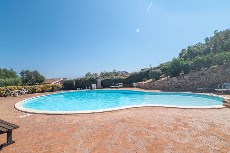 Rental apartment with patio, pool & garden | Garden view in Loiri Porto San Paolo