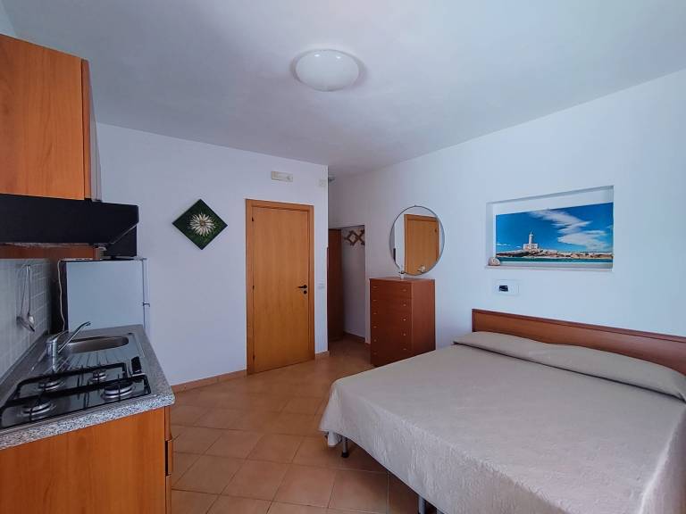 Holiday Home 'Villa Elvira Monolocale' with Private Terrace, Shared Garden and Air Conditioning — photo 3