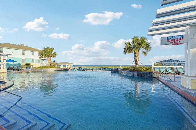 Mermaid s Cove Stunning Pointe West Beachside Home