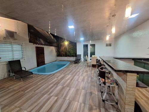 Casa compartilhada com Quarto e Suite no Parque 10 — photo 2
