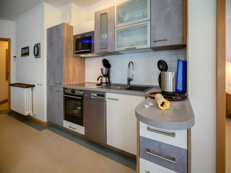 Komfortplus Ferienwohnung mit 1 Schlafzimmer und Balkon im Obergeschoss — photo 3