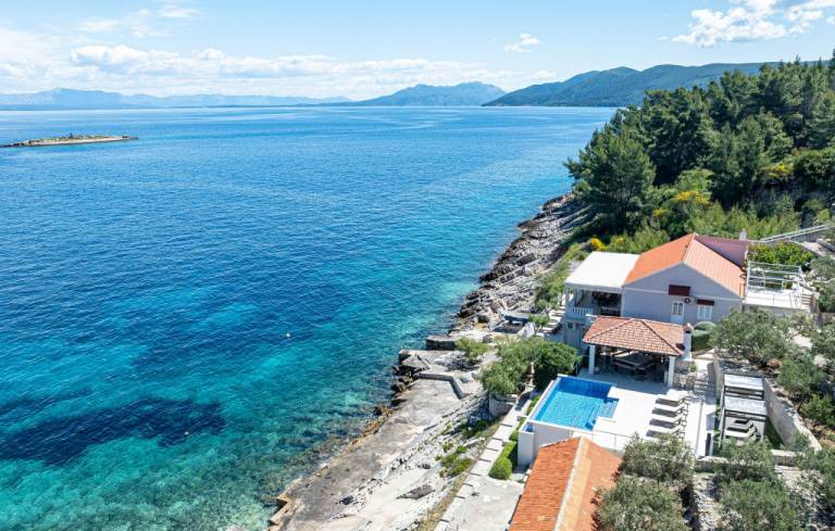 Seafront Villa Mijo by Villas Guide