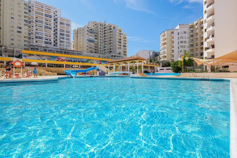 Holiday Apartment "Karol Vaz" with Balcony, Shared Pool & Wi-Fi in Portimão