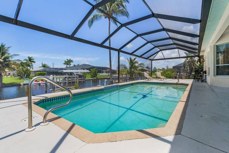 Waterfront Fun with Heated Pool, Private Dock & Gulf Access – Tropical Delight - Roelens in Cape Coral, FL