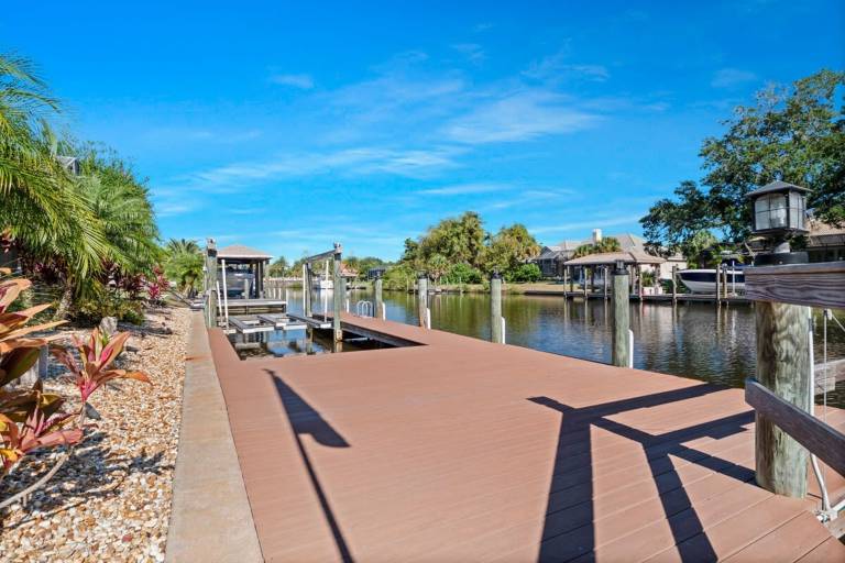 Luxury Heated Pool Home on Saltwater Canal w Tiki — photo 4