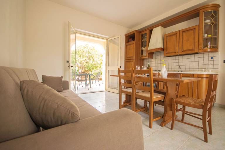 Apartment with patio, garden & BBQ | Garden view in San Teodoro