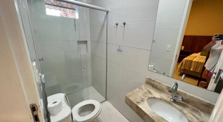Suites Curio - Passarim Hospedagem — photo 4