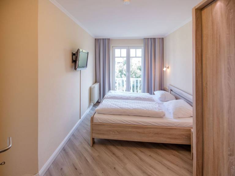 Komfortplus Ferienwohnung mit 1 Schlafzimmer und Balkon im Dachgeschoss — photo 3