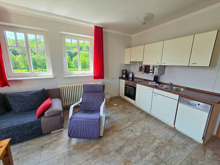 Komfortplus Ferienwohnung mit 1 Schlafzimmer und Balkon im Dachgeschoss — photo 2