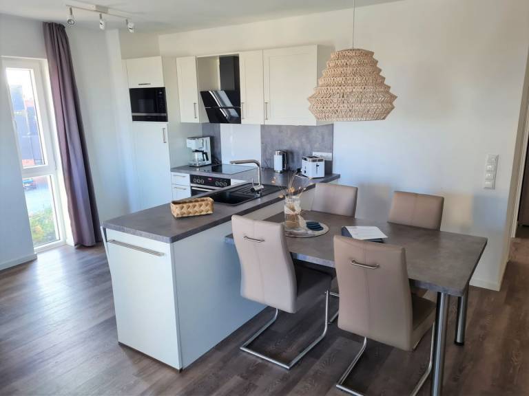 Moderne, hochwertige Ferienwohnung, Sauna, großer Balkon, Meerblick, strandnah in Wangerland