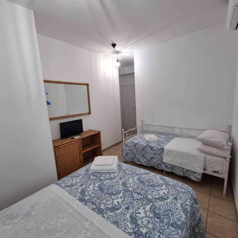Room 'L'angolo Azzurro' with Wi-Fi and Air Conditioning — photo 2