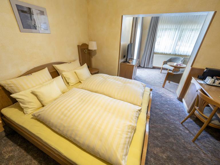 Dreibettzimmer mit Balkon