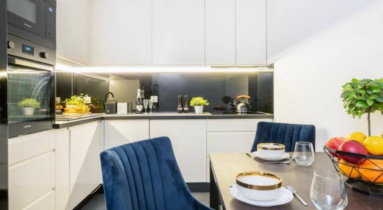 Holiday apartment with patio in Lódz