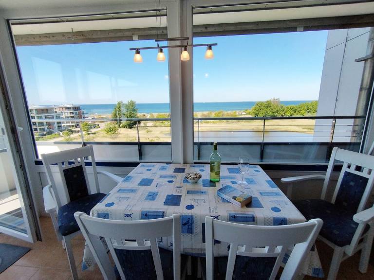Schöne Ferienwohnung in der 5. Etage eines gepflegten Apartmenthauses mit traumhaftem Blick zum Binnensee sowie zur Ostsee! — photo 2