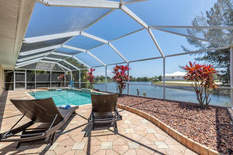 Great Water views! Southern Exposure Pool, Pet-Friendly- Villa On The Lake -Roelens Vacations in Cape Coral, FL