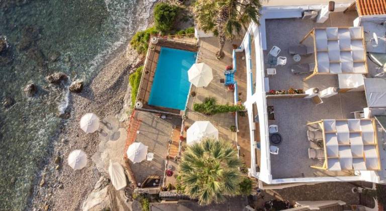 Exclusive Seaside Retreat with Shared Pool & Private Beach Access in Malevizi