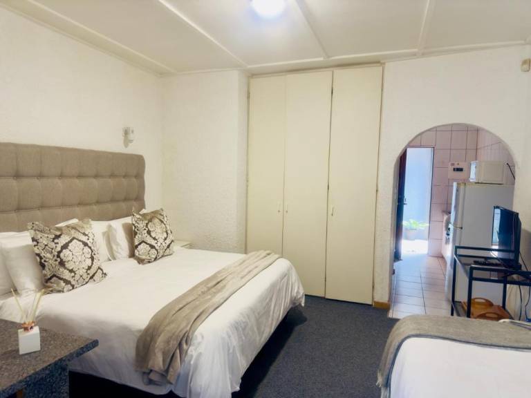 Busa House – Dreibettzimmer