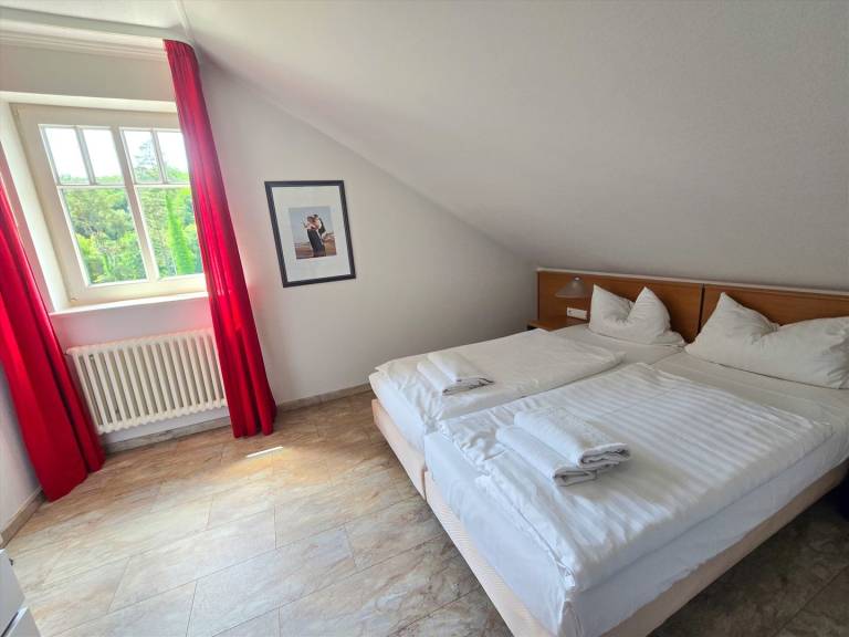 Komfortplus Ferienwohnung mit 1 Schlafzimmer und Balkon im Dachgeschoss — photo 4