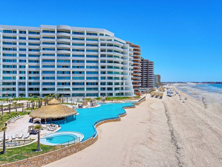 Brand New Modern 2BR Gem on Iconic Sandy Beach