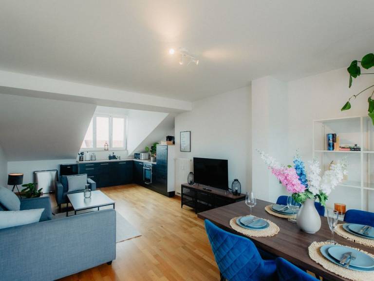 Rooftop Appartement mit Wohnküche und Terrasse