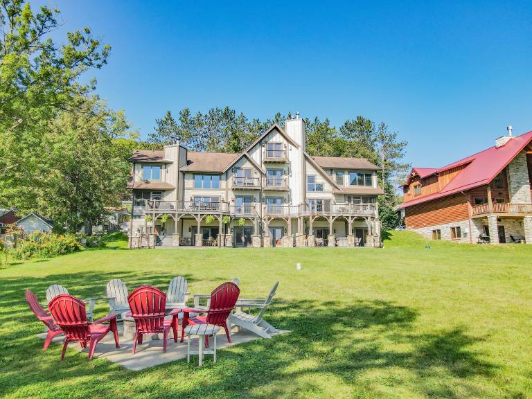 Walk to Wisp Lakefront home with fire pit and dock