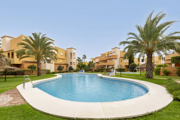 Rental apartment with pool, patio & yard | Garden view in Playas