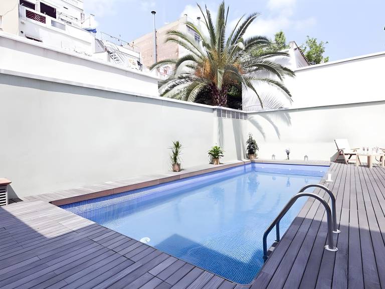Spacious serviced apartment with patio & pool | Next to Casa Milà | Dogs allowed in Barcelona