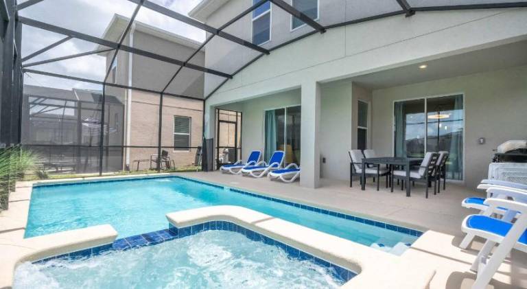 Luxury 6BR Resort Home - Pool, Hot Tub & BBQ - Near Disney! in Kissimmee, FL