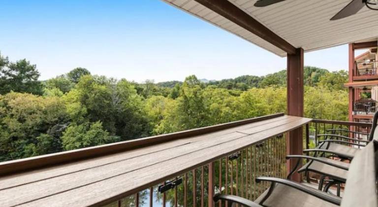 Bandit's Riverfront Retreat - Mountain View- Condo-Fishing-Balcony-Fireplace-Great Location! in Sevierville, TN