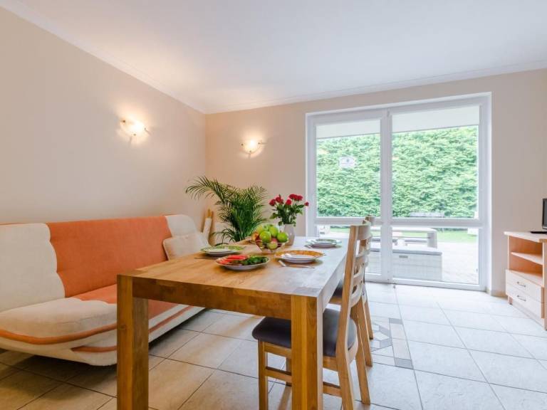 Apartment with terrace, grill & yard in Ustka