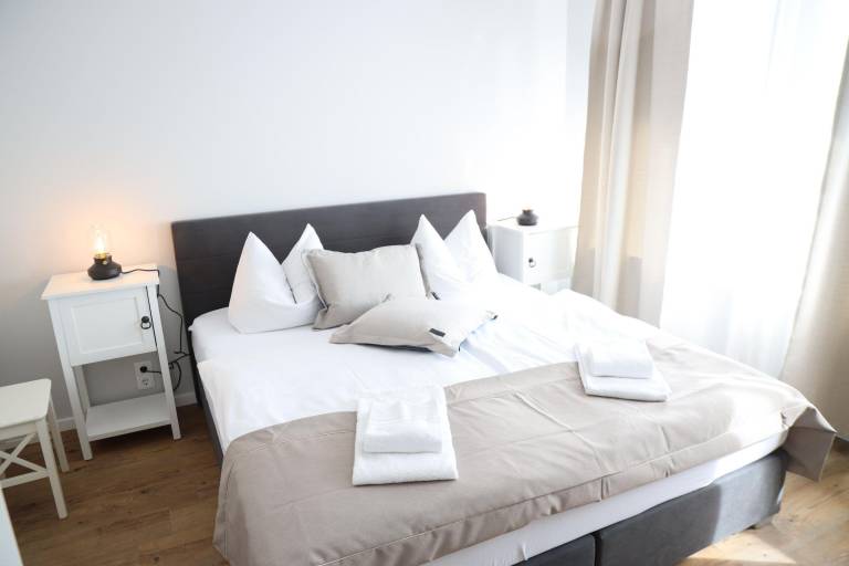 Apartment with barbecue, patio & yard | Garden view in Timmendorfer Strand