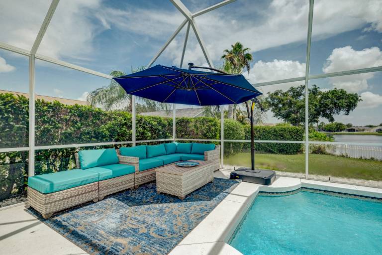 Family-friendly charming house with BBQ & private pool | Water view | Pets allowed in Bradenton, FL