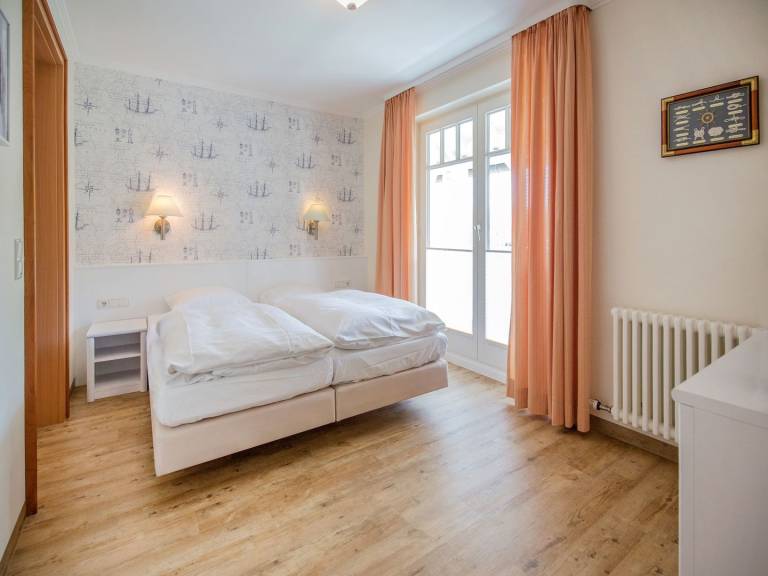 Komfortplus Ferienwohnung mit 1 Schlafzimmer und Balkon im Obergeschoss — photo 4