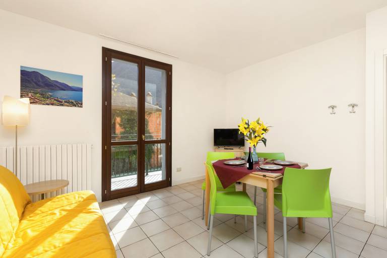 Family-oriented nice holiday apartment with garden | Mountain view | Beach nearby | Dogs allowed in Porlezza