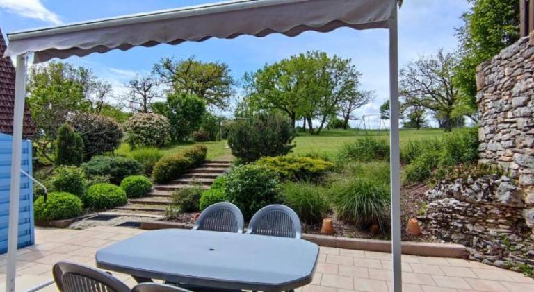 Vacation home with BBQ, yard & patio — photo 3