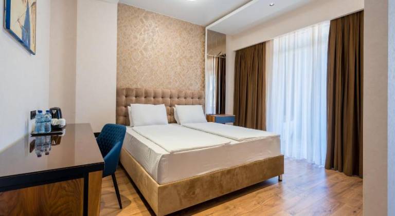 Olympus Hotel By Umbrella