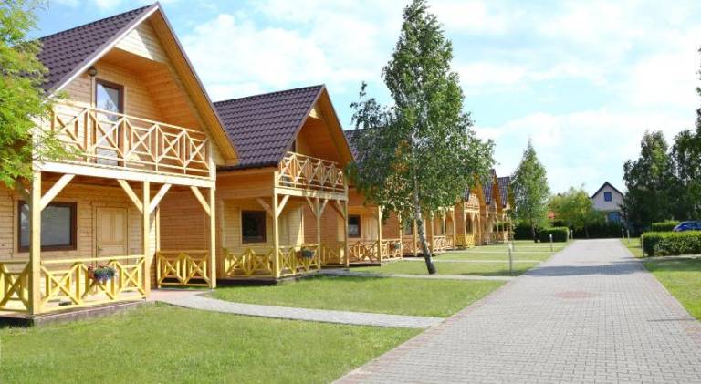 Holiday apartment with BBQ, yard & patio in Koszalin
