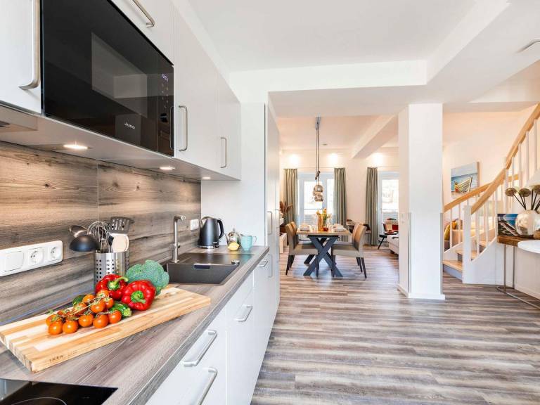 FeWo Unsere Perle: Großzügige 110m² Maisonette mit Sauna, Kamin & Meerblick — photo 5