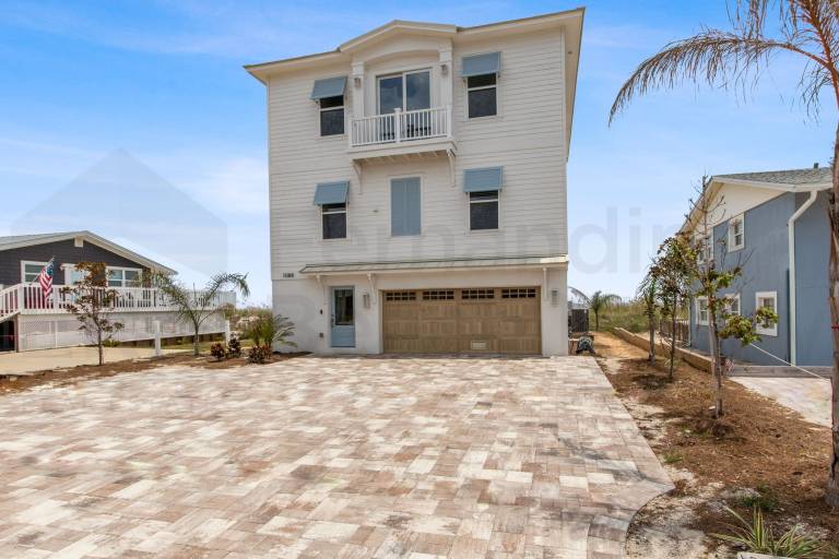Experience oceanfront luxury at 1088 S. Fletcher Ave, a spacious 5-bedroom house — photo 4