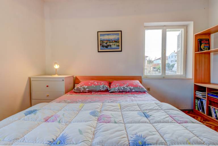 The apartments consists of two bedrooms, a bathroom, a kitchen and a living room — photo 4